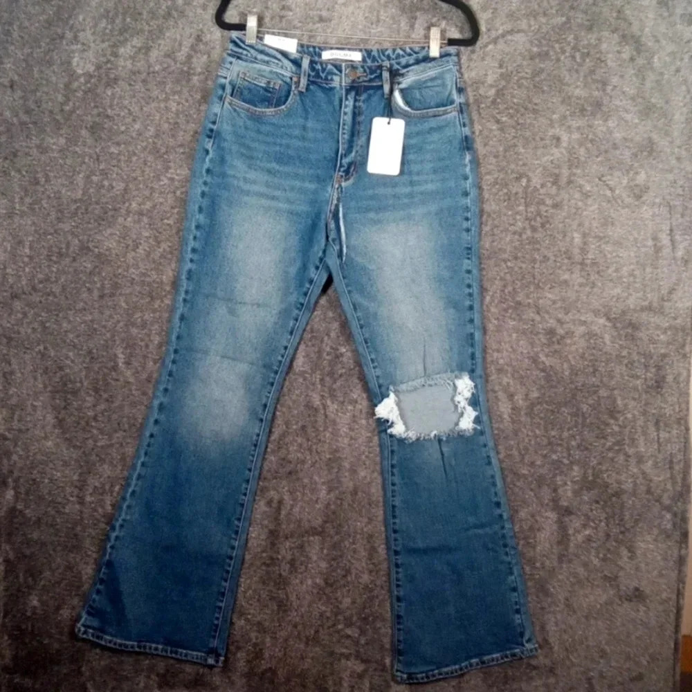 Dogma women's denim high rise flare leg jeans Medium wash size 29